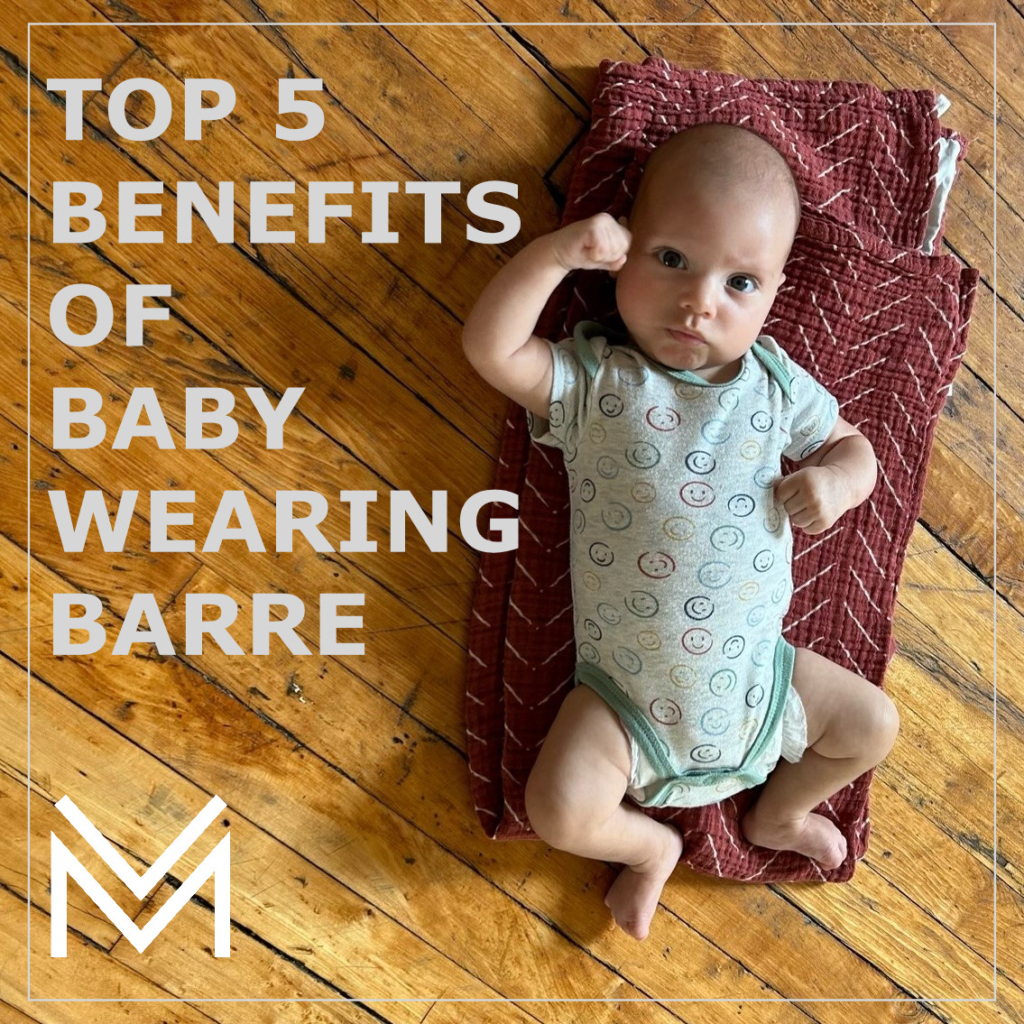 baby wearing barre fitness exercise class postpartum